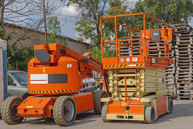 industrial forklift transporting goods in a warehouse setting in Biola